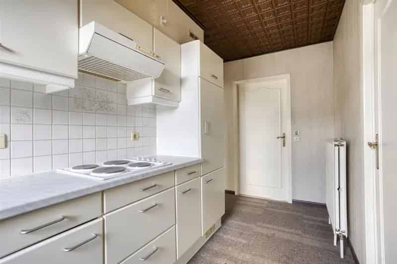 Gelijkvloerse woning te Heusden Zolder 2 slaapkamers garage tuin