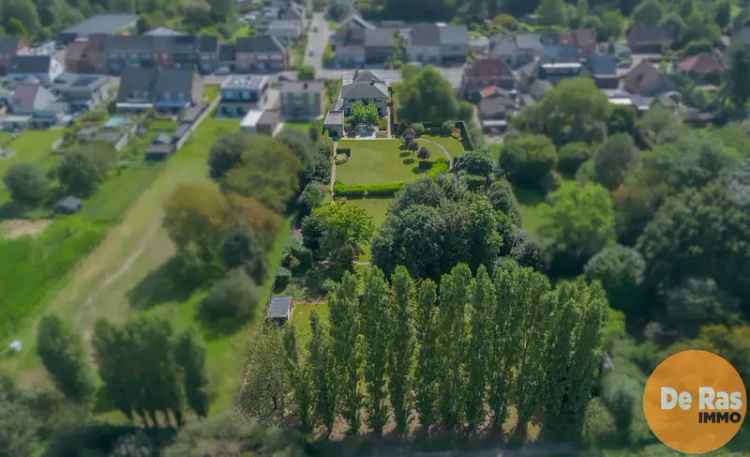 Koop huis in Gijzegem met praktijkruimte en mooie parktuin