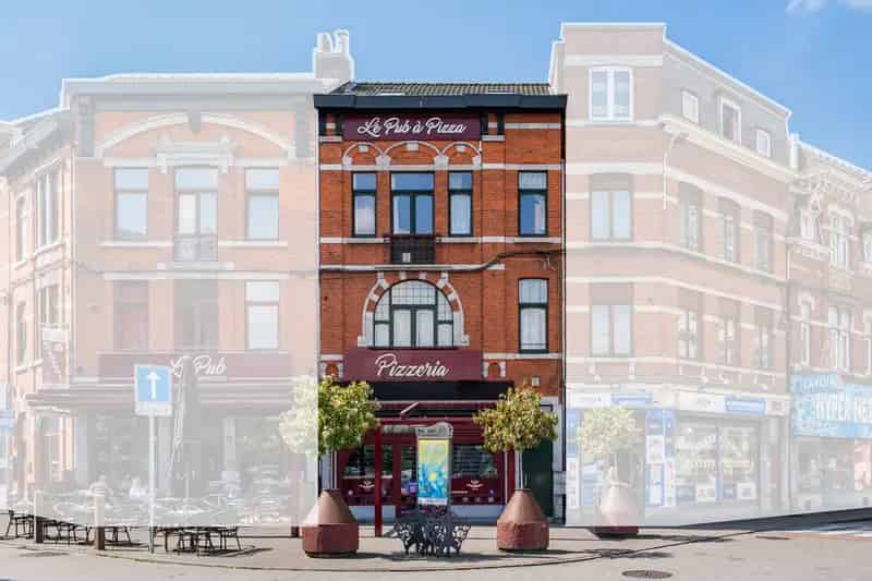 Te Koop:  Pand met winkel en appartementen in Seraing