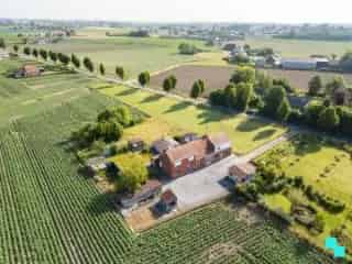 Bouwgrond Izegem - Landelijke Dubbelwoonst te renoveren of af te breken