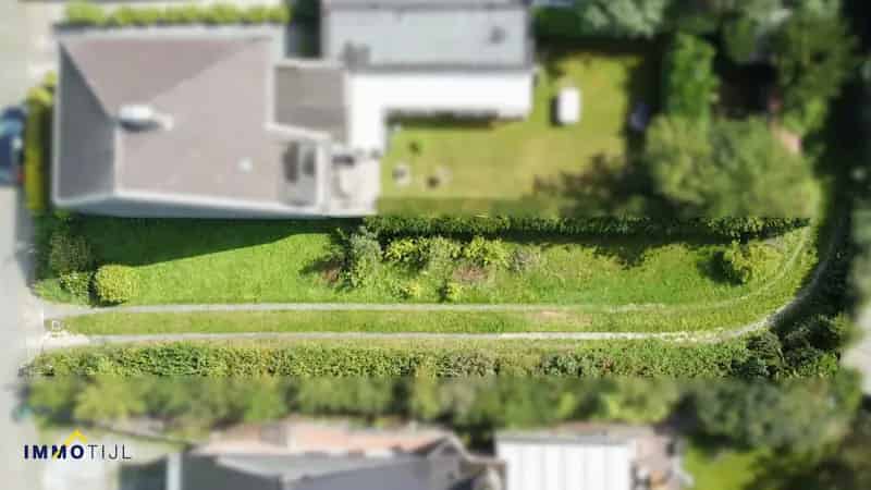 Bouwgrond Herdersem: 370m² Halfopen Bebouwing Zuidwest