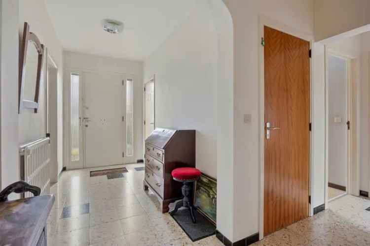 Viergevelwoning in gewilde buurt