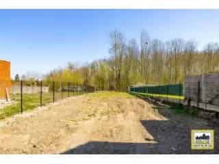 Bouwgrond Sint-Lievens-Houtem - Halfopen Bebouwing - 506m²