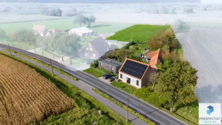 Te koop huis met bijgebouw en weiland in landelijke omgeving