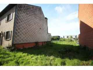 Bouwgrond Halle - 435m² - Gelegenheid tot bouw gesloten bebouwing