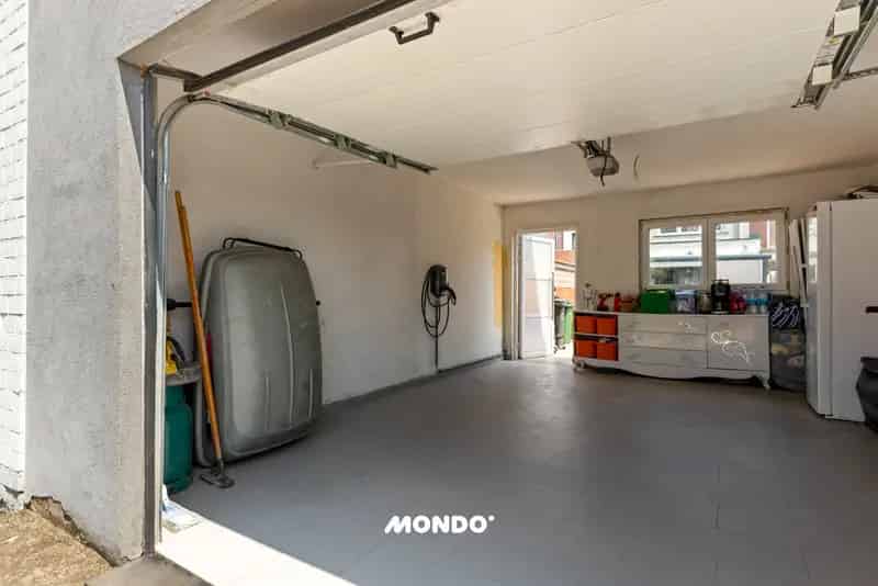 Huis te koop Rumst: Instapklare Rijwoning met Garage en Tuin