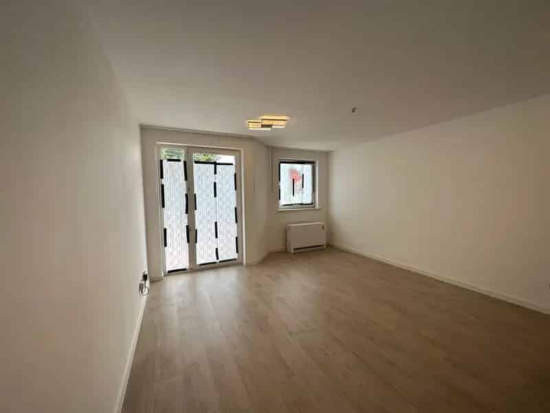 Appartement te koop: gelijkvloers met tuin en garage