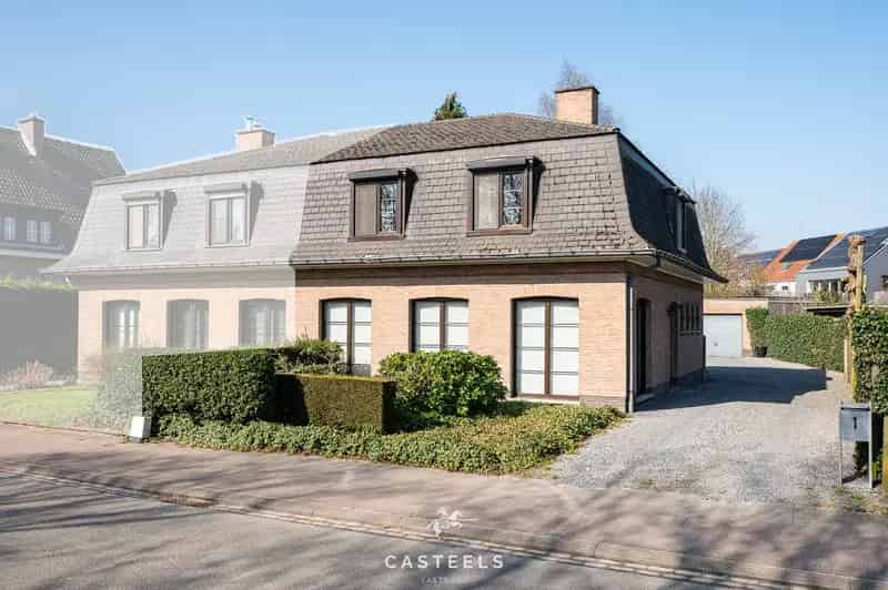 Huis te koop De Pinte: halfopen woning met potentieel
