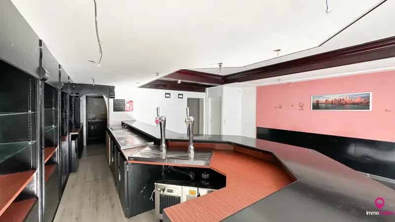 Ruim handelspand met garage in het centrum van Beringen!