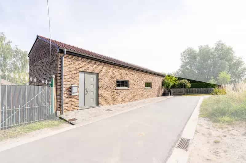 Bungalow te Oordegem: 2 slaapkamers, tuin en parkeerplaats