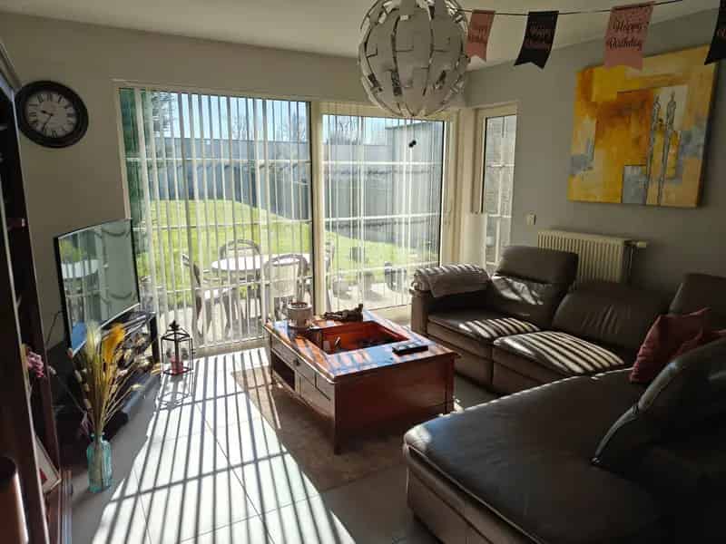 Gelijkvloers appartement 2 slaapkamers garage tuin te koop