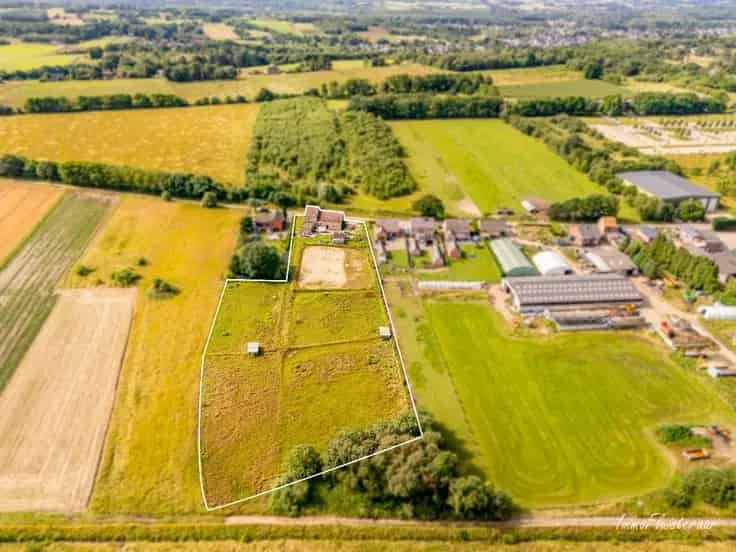 Huis Te Koop Aarschot: Charmante Hoevewoning met Paardenstallen en Weilanden
