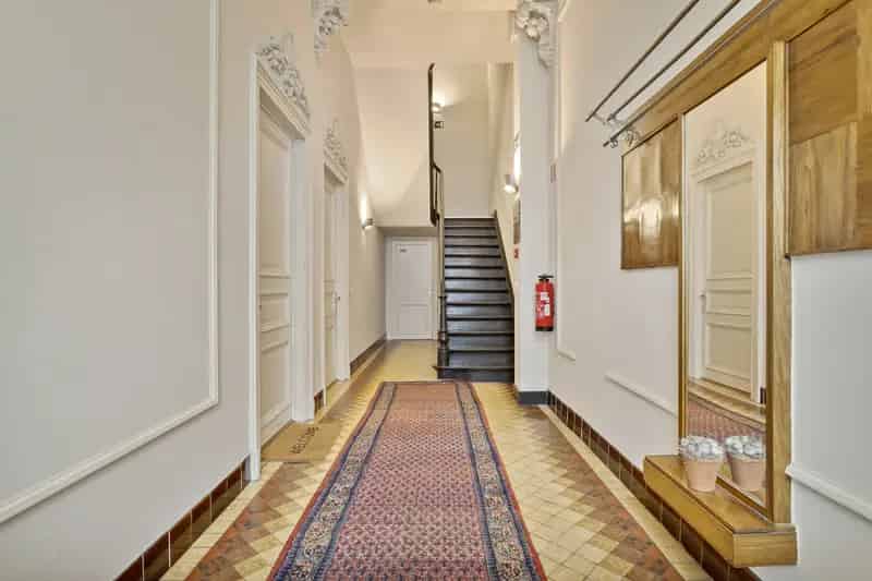 Opbrengstpand Leuven: Duplex Appartement & 5 Studentenkamers