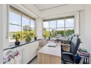 Huis te koop Wichelen - Ruime woning met garage en tuin