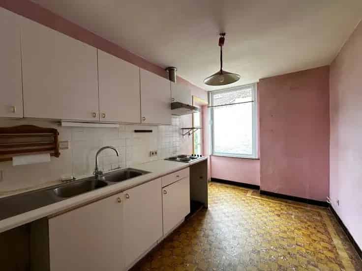Huis Te Koop 130m² met Garage en Zolder 55m² Nabij Centrum