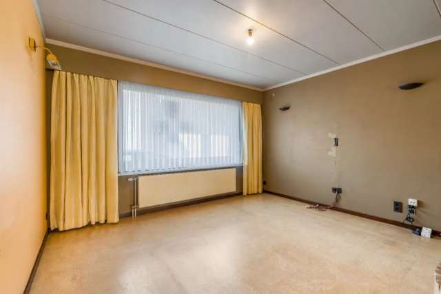 Gelijkvloers appartement met praktijkruimte te koop