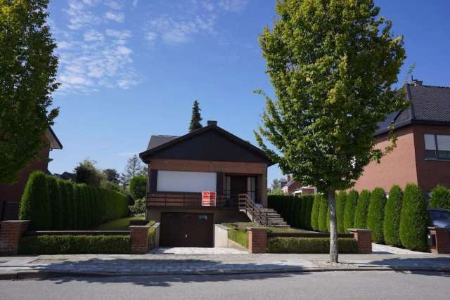 Degelijke, te moderniseren alleenstaande woning met prachtige tuin