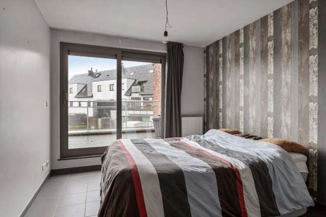 Appartement met één slaapkamer, groot terras en garage