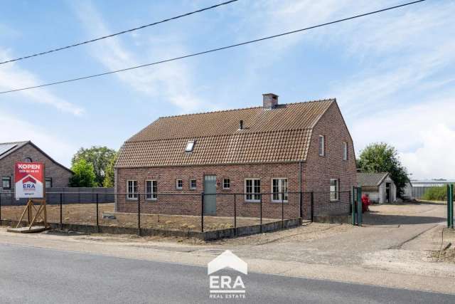 Herbouwde hoeve met voormalig tuinbouwbedrijf op 1,4ha