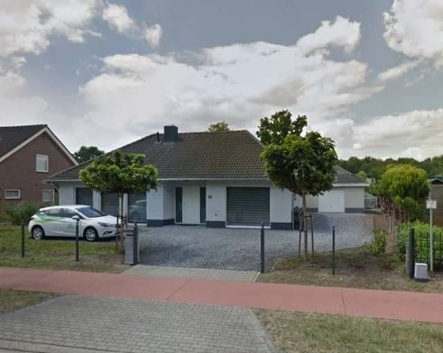 Mooie gerenoveerde woning op in Achel nabij de grens op 13a97 met grote losstaande garage/werkplaats (+/- 60 m²)!