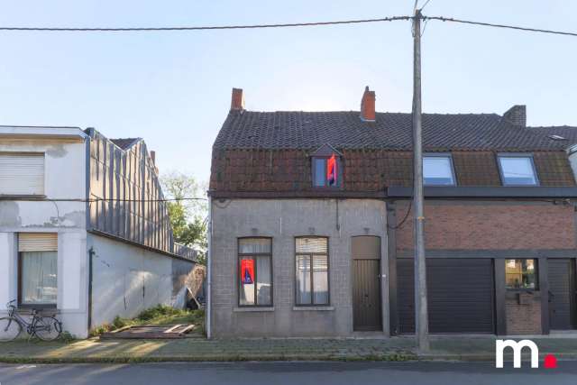 Halfopen woning met veel potentieel op 430 m²